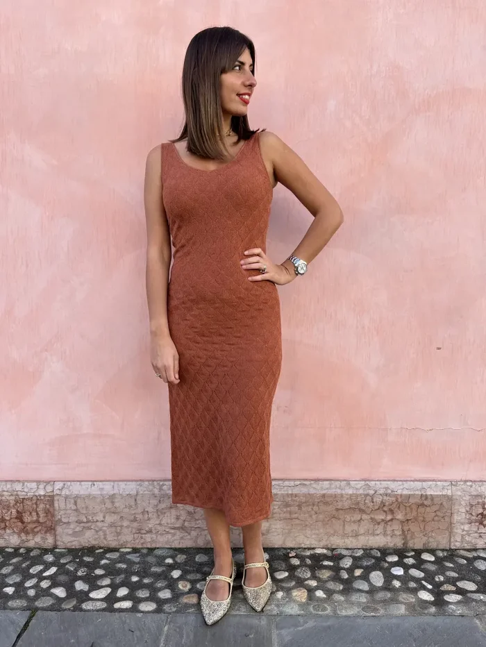 ABITO TRAFORATO BOUCLE’